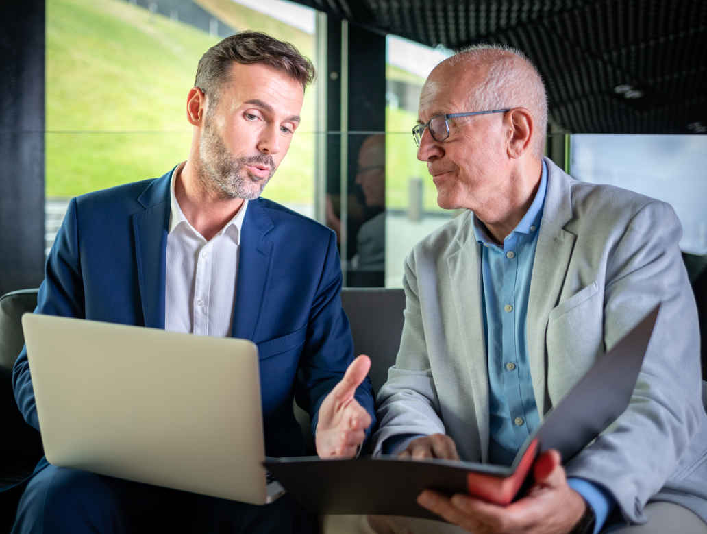 business owner receiving business tax planning advice from a tax expert.